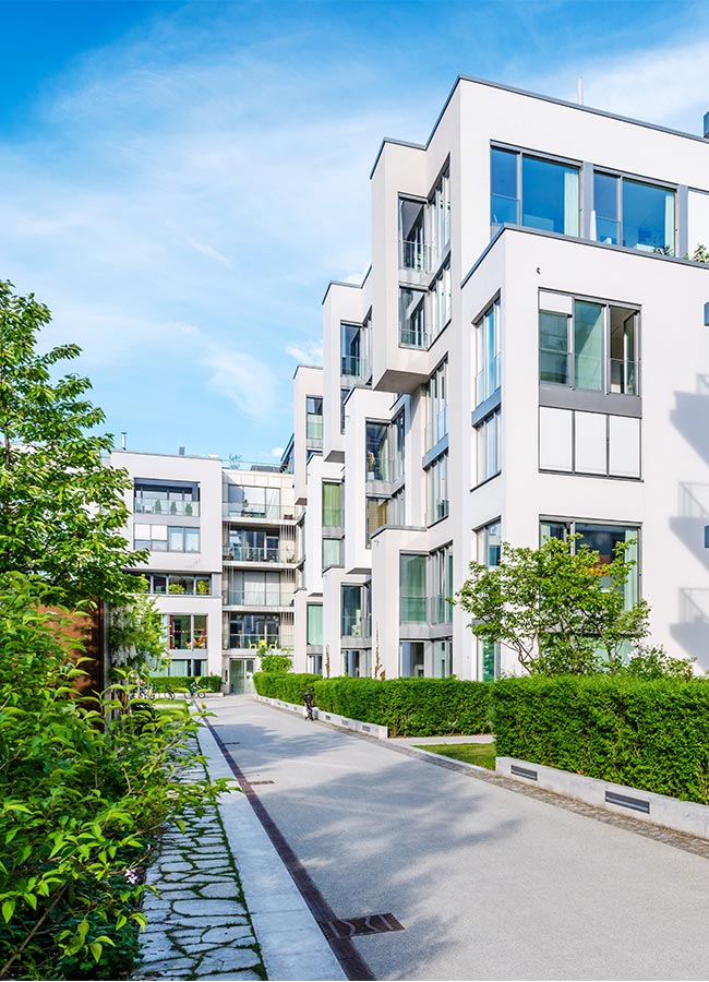 Landscaper trimming bushes Landscaper trimming bushes