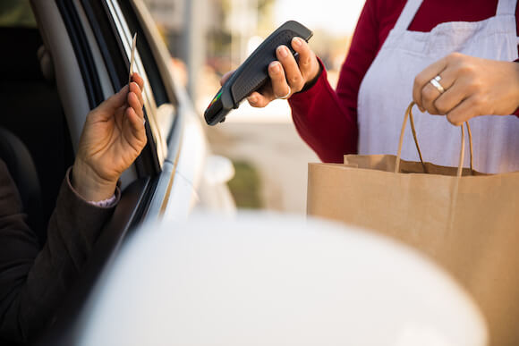 customer transaction parking lot pickup area clean maintained property california