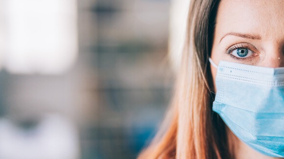 pandemic woman afraid to return to work office or shopping center