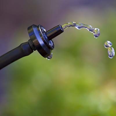 Close-up of water dripping out of a water drop system