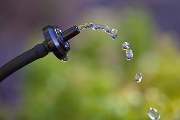 Close-up of water dripping out of a water drop system