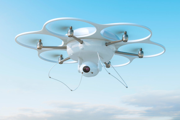 Aerial Drone with Camera on Inspection Landscaping Professional Tending to Fields