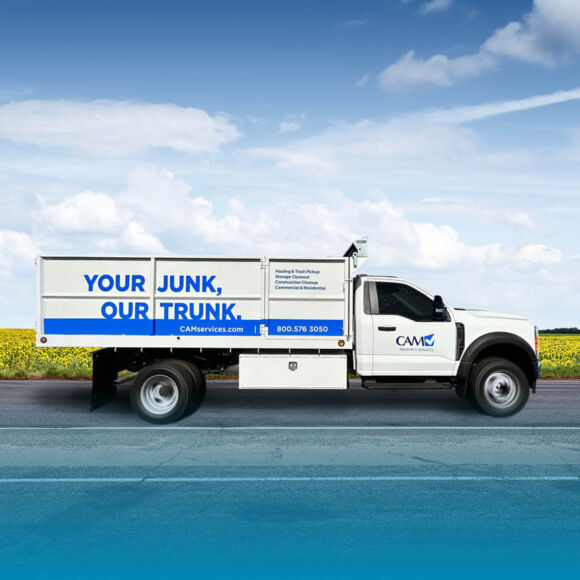 CAM Property Services Hauling Truck "Your Junk, Our Trunk"