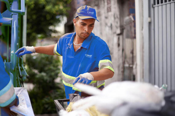 Professional Cleaner Wiping Down Glass