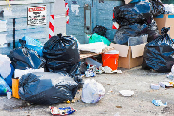 Trash Piling Up Near Property Dumpsters