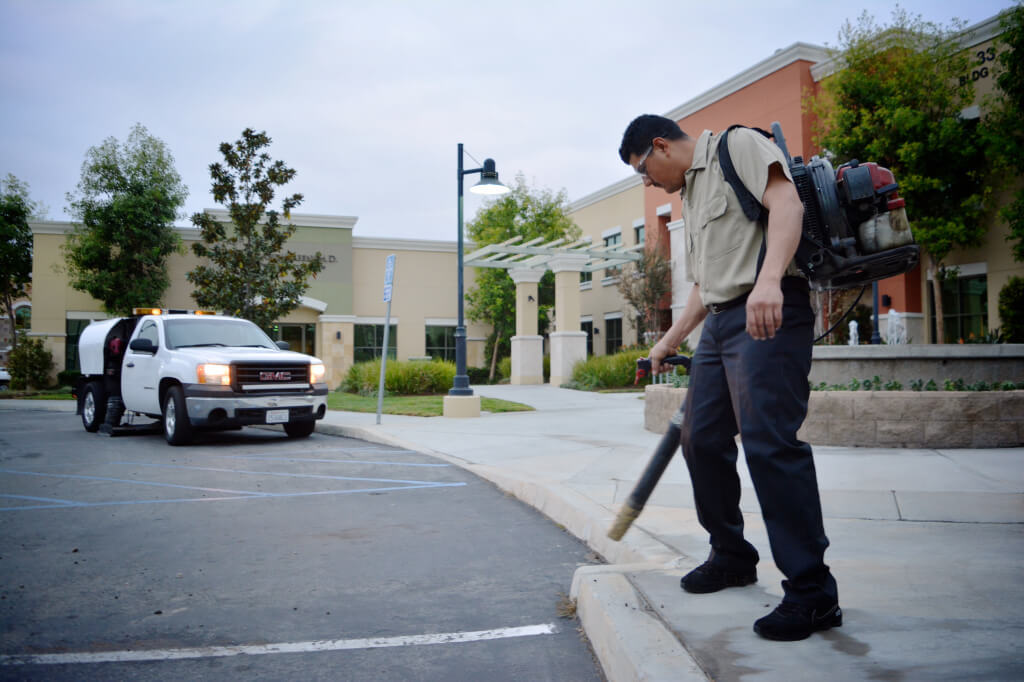professional day porter windblow cleaning sidewalk professional day porter windblow cleaning sidewalk