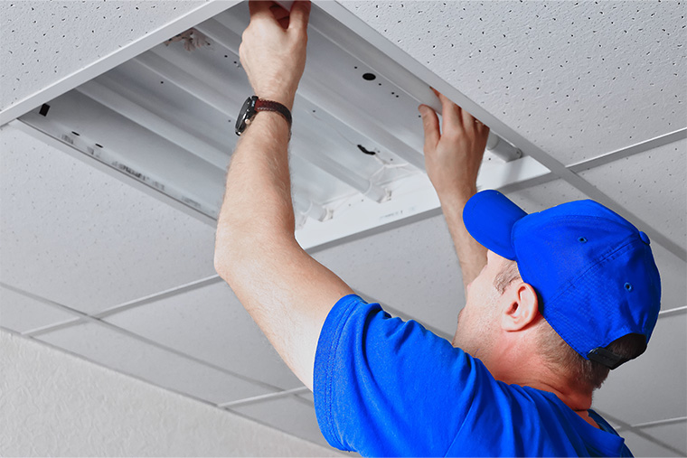 handyman-fixing-vertical-chute